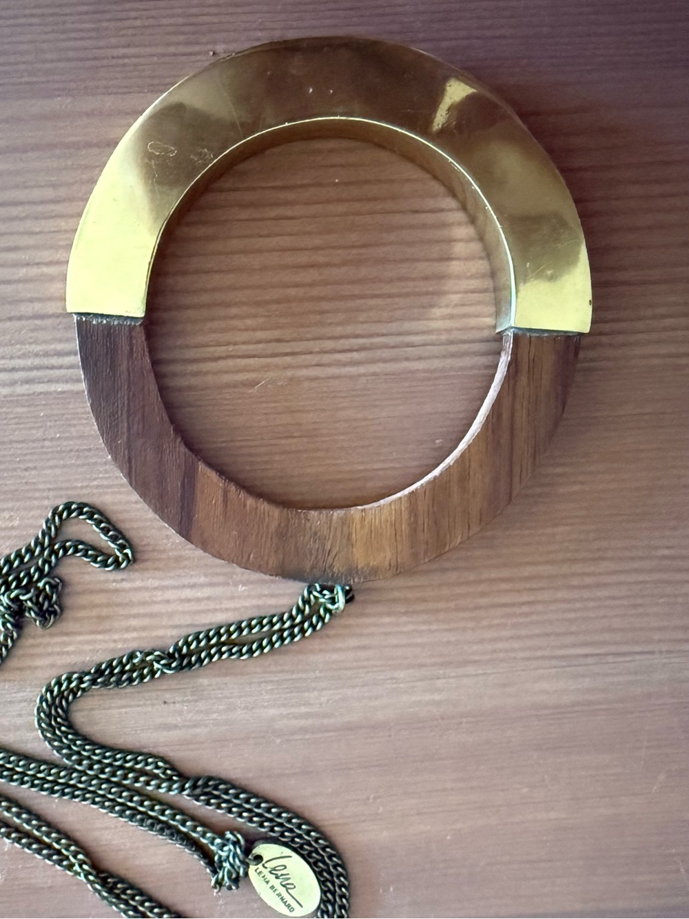 Gold Metal and Wood Necklace with Elegant Design